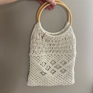 Retro macrame bag with wooden handles. No tag. Good condition. Unlined.